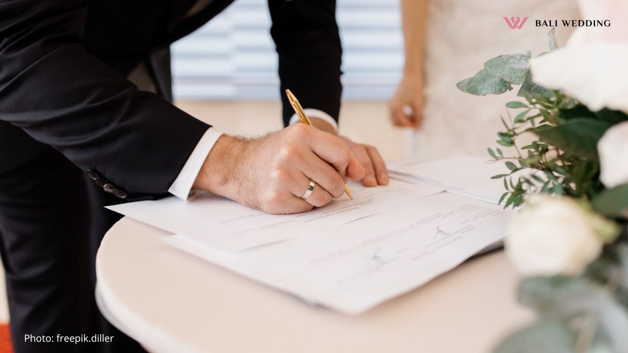 Couple in love is signing official marriage documents