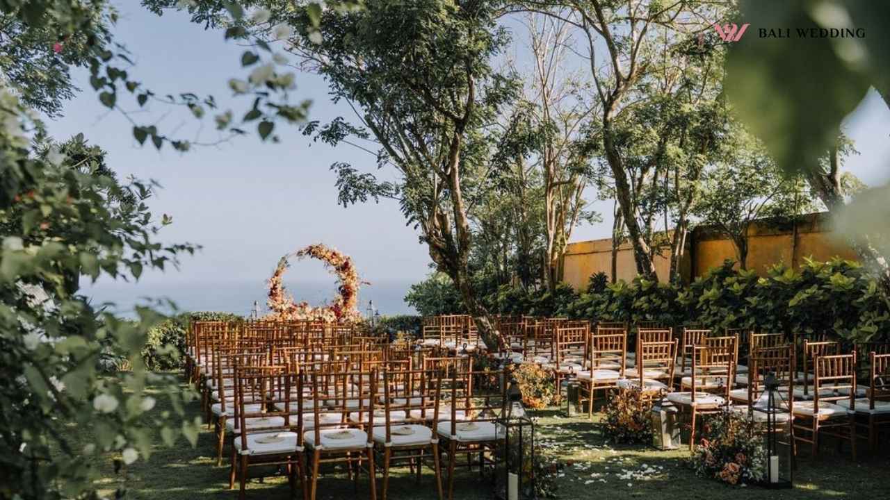 Outdoor garden wedding setup with ocean view