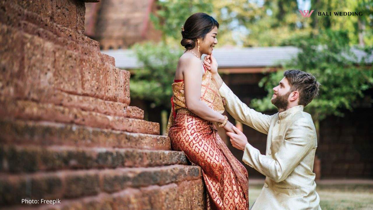 Asian bride and Caucasian groom have romantic time with Thailand dress