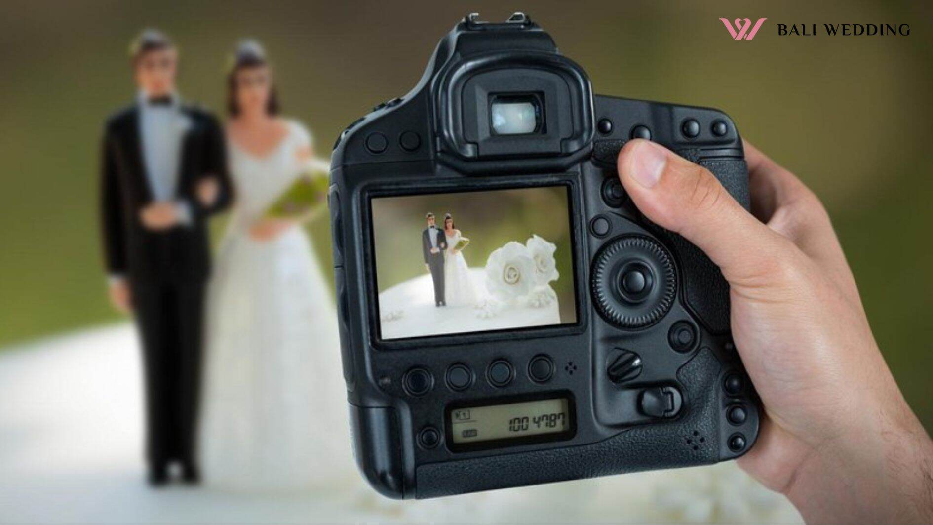 Composite image of cropped hand of photographer holding camera