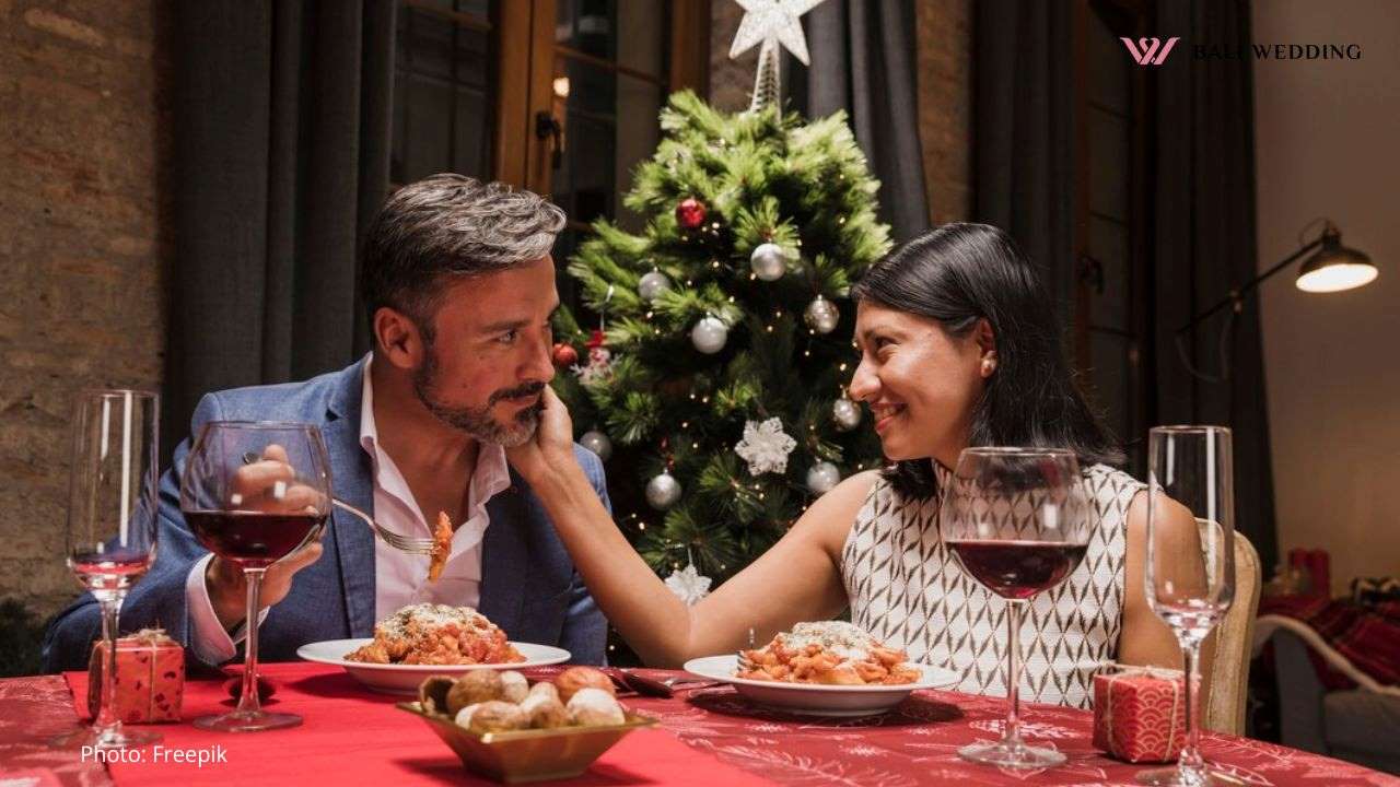 Cute couple having christmas dinner