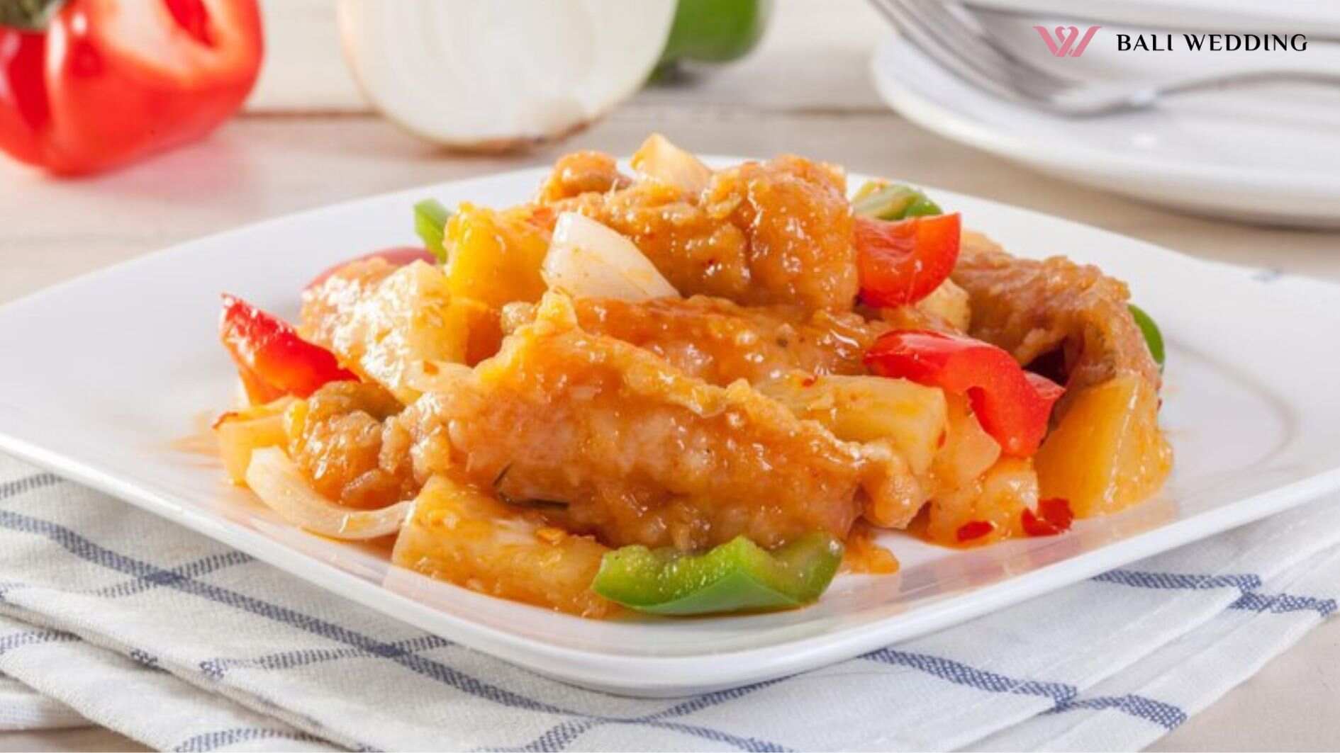 High angle view of sweet and sour fried fish in plate on table