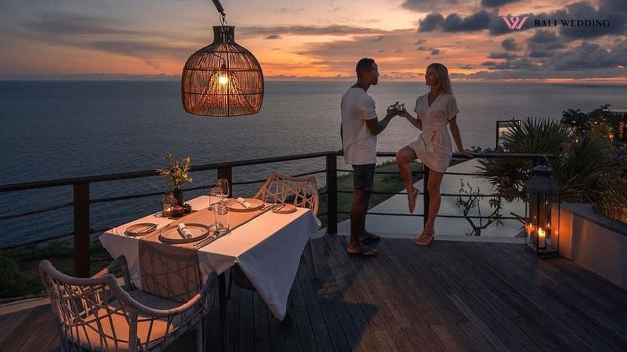 Sunset balcony dinner overlooking ocean