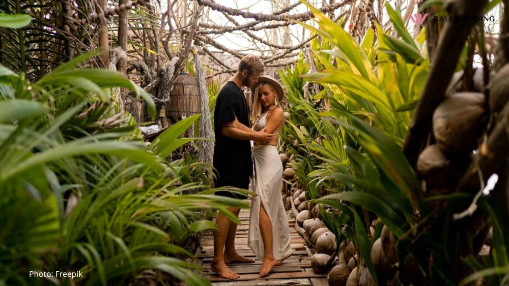 A Couple Embracing Each Other at a Jungle