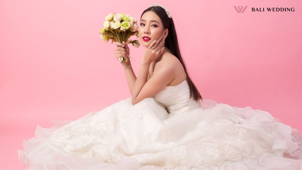 beautiful asian bride portrait pink studio